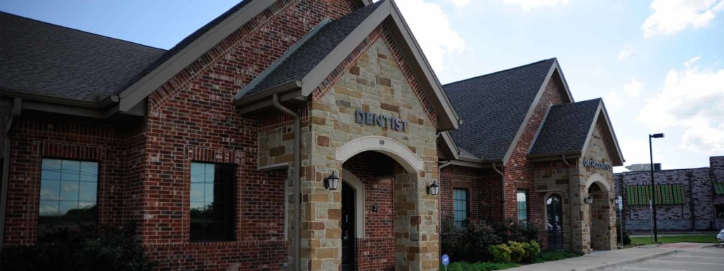 The exterior of the Soothing Dental dentistry office features gorgeous red brick.