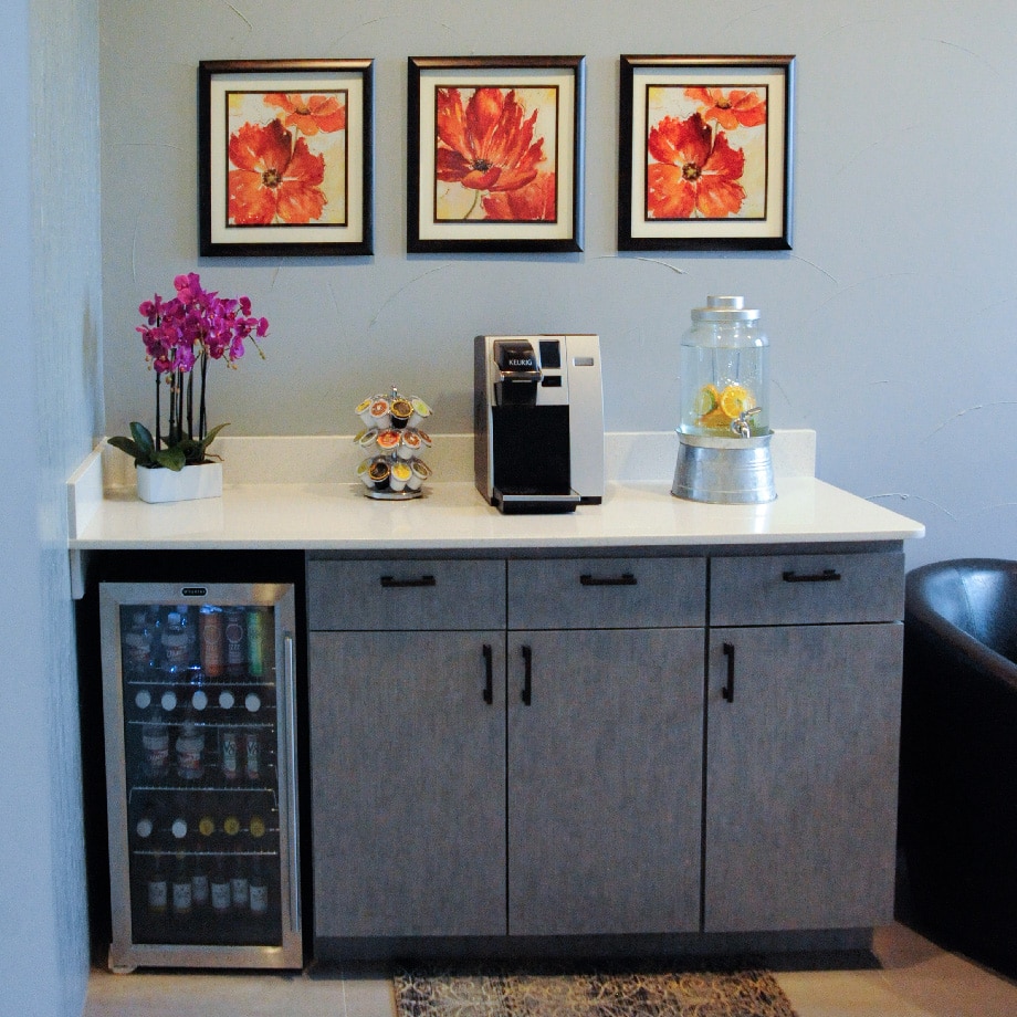 The relaxation room for patients at Soothing Dental includes citrus-infused water, free coffee and beautiful flowers.